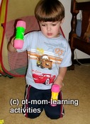 Using toy hammers for coordination skills