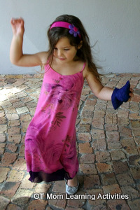 Hopping while holding a bean bag