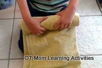 rolling towels is good for bilateral integration skills