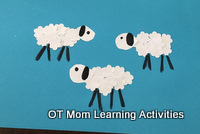 Use flower shaped craft hole punch to make a paper sheep craft Use flower shaped craft hole punch to make a paper sheep craft