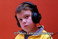 child wearing headphones to help deal with sensory processing issues