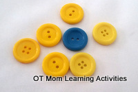 toddler spot-the-odd-one-out activity using buttons