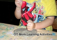 pounding playdough with alternating movements for bilateral coordination