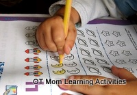 preschool child using a jumbo pencil crayon that suits his small hands preschool child using a jumbo pencil crayon that suits his small hands
