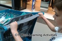 Pushing a trolley full of groceries is a good heavy work activity for proprioceptive input.