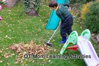 Raking leaves is a good gross motor activity to build kids strength and endurance