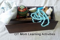 a sensory box full of sensory fidgets and other items to touch and feel