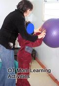 an occupational therapist facilitating the correct movement in a child doing a gross motor activity