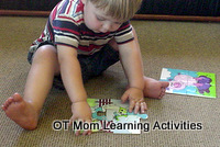 toddler doing a 4 piece puzzle toddler doing a 4 piece puzzle