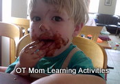 toddler eating messy food