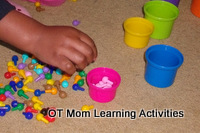 picking up small items for a fine motor activity