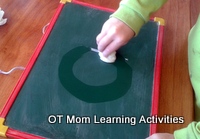practice letter formations using a small chalkboard and a wet sponge