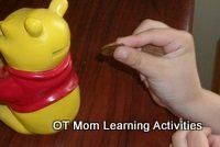 using the fingers to put money through a slot