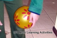 a fine motor activity using a plastic ball