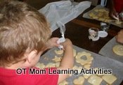 squeezing a cake frosting/icing bag to work on hand strength