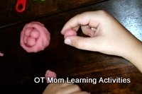 rolling playdough balls for fine motor skills